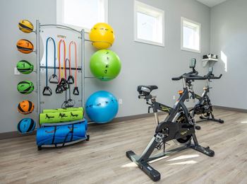 24/7 State-of-the-art fitness center with wellness studio